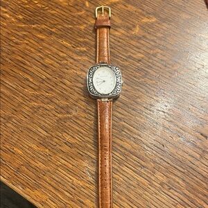 Narmi watch with Brown Leather Strap with Silver Bezel. Charming